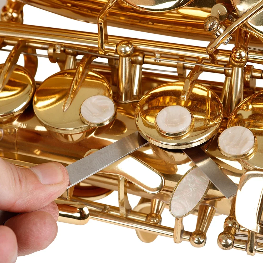 Saxophone Repair Tool Leather  - огляд і ціна Musical Instrument Repairs